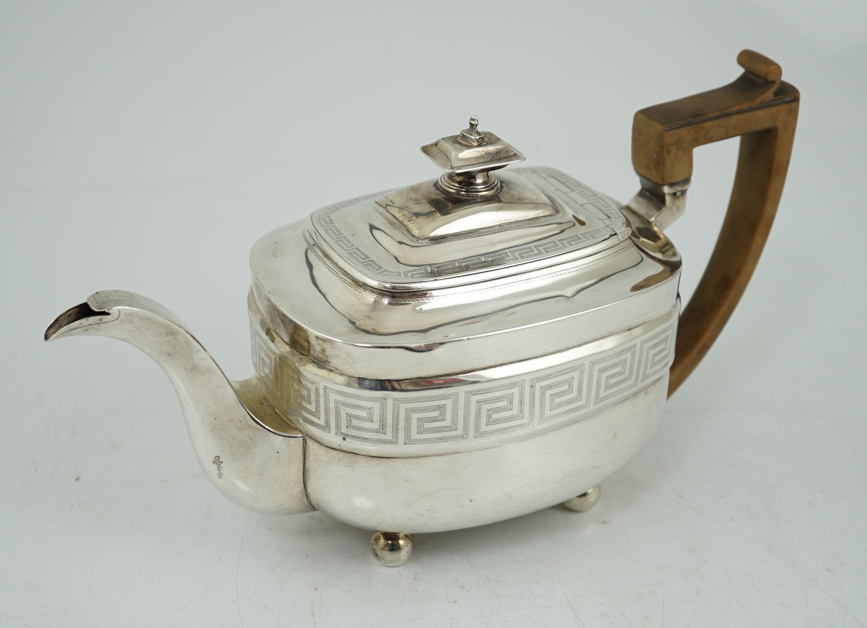 A George III silver shaped rectangular teapot, by Soloman Hougham,`